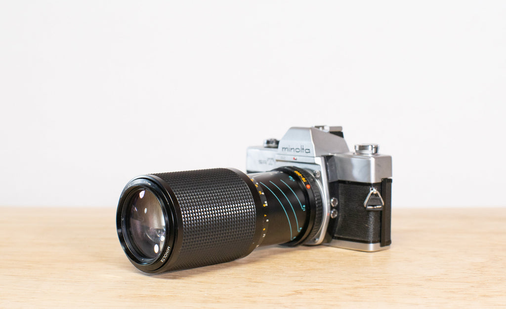 Minolta MD 75-200mm 1:4.5 telephoto zoom Lens.